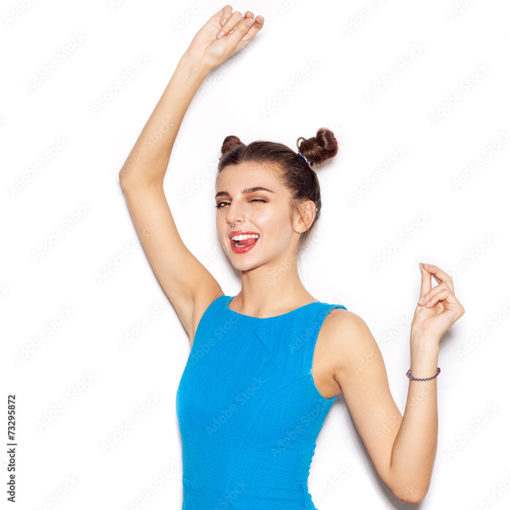 Young woman saluting and winking and showing tongue Young woman saluting and winking and showing tongue