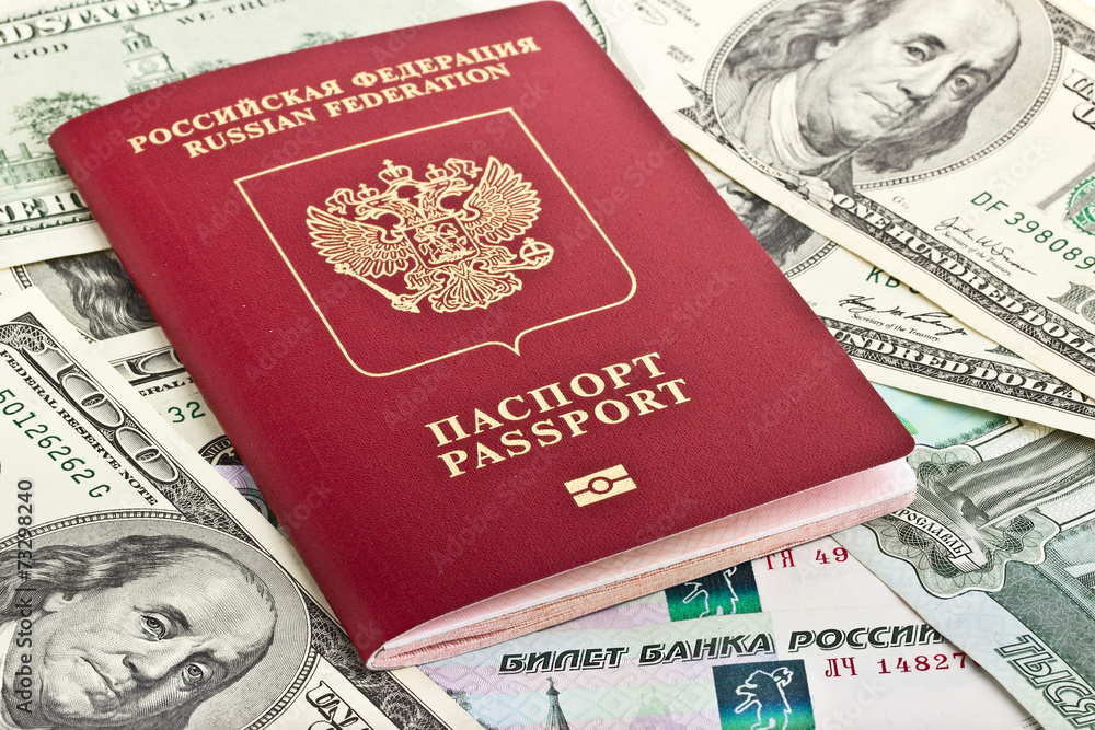 Russian passport on a background of money Russian passport on a background of money