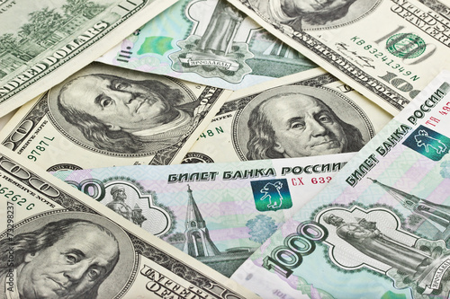 Background of Russian rubles and US dollars
