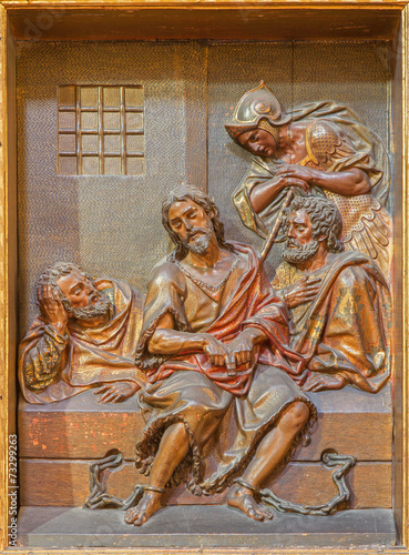 Fototapeta Seville - carved relief of St. John the Baptist in prison