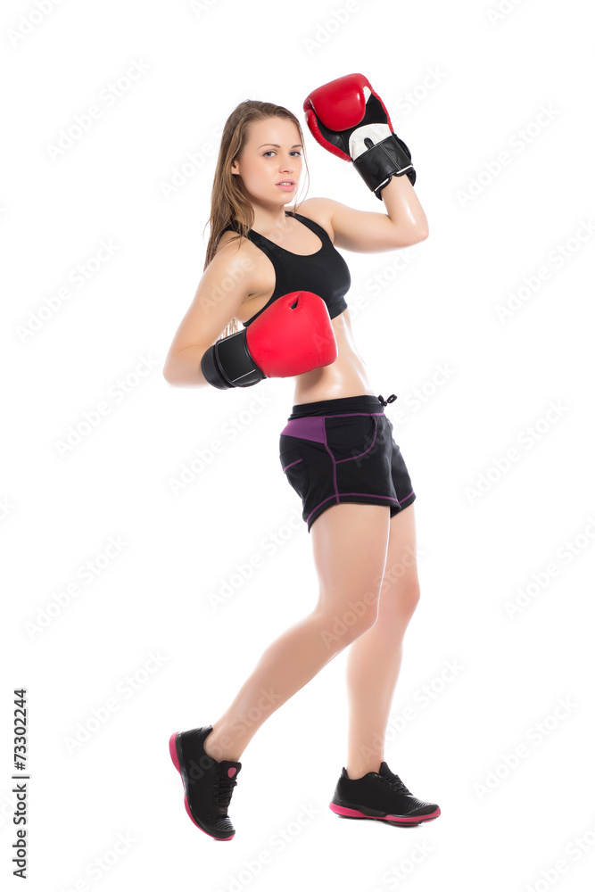 Young blonde wearing boxing gloves Young blonde wearing boxing gloves