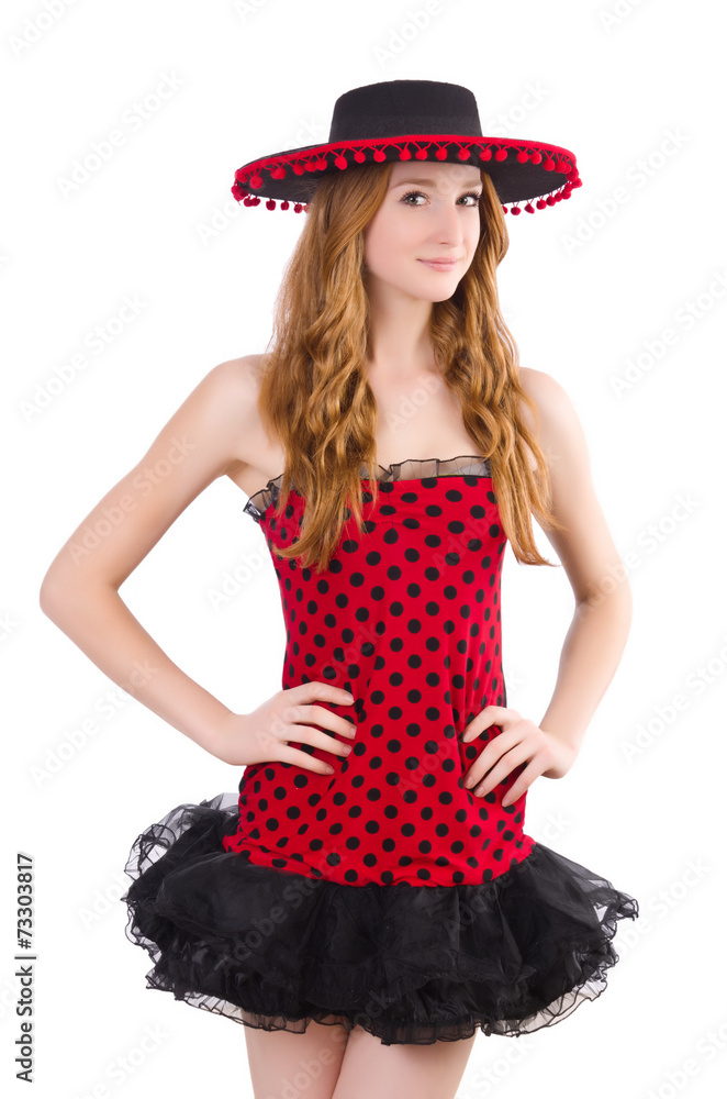 Young redhead girl in polka dot dress and sombrero isolated on Young redhead girl in polka dot dress and sombrero isolated on