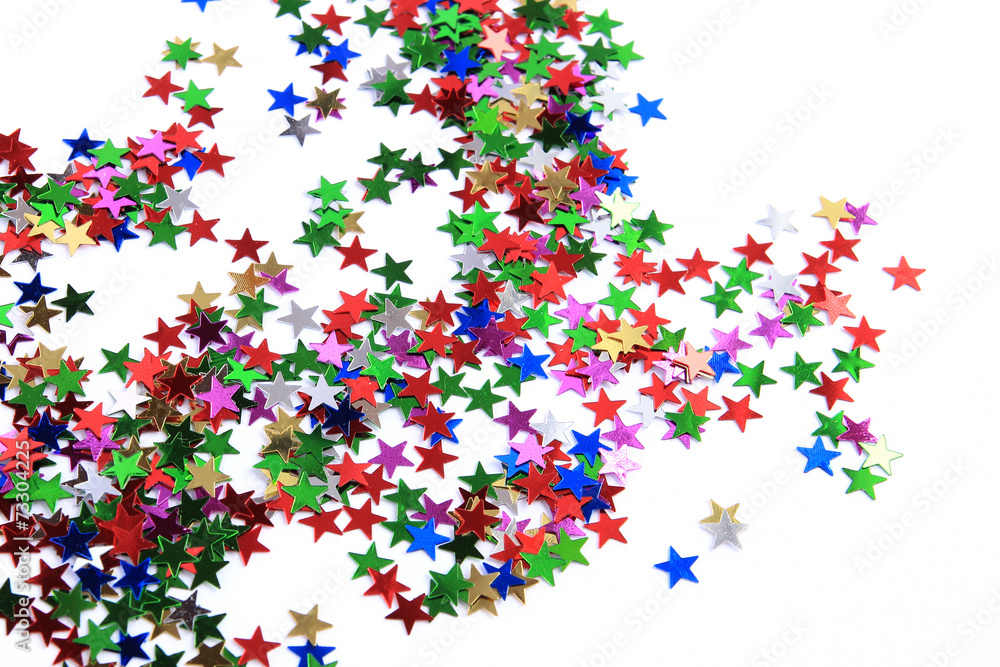 Multicolored star confetti on white background