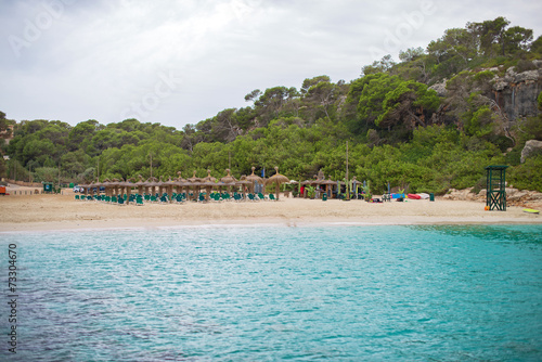 Sandy beach between the rocks. Private beach.