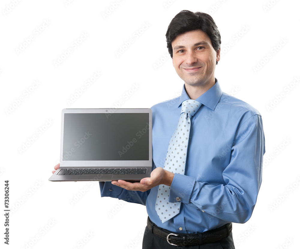 Businessman holding laptop computer Businessman holding laptop computer