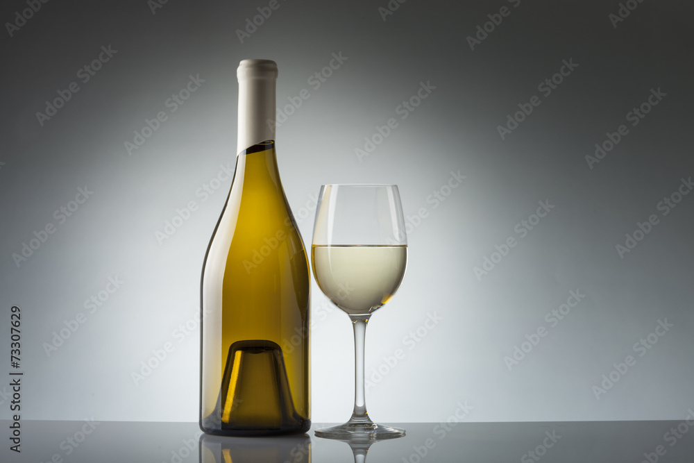 Wine bottle and glass with copy space Wine bottle and glass with copy space