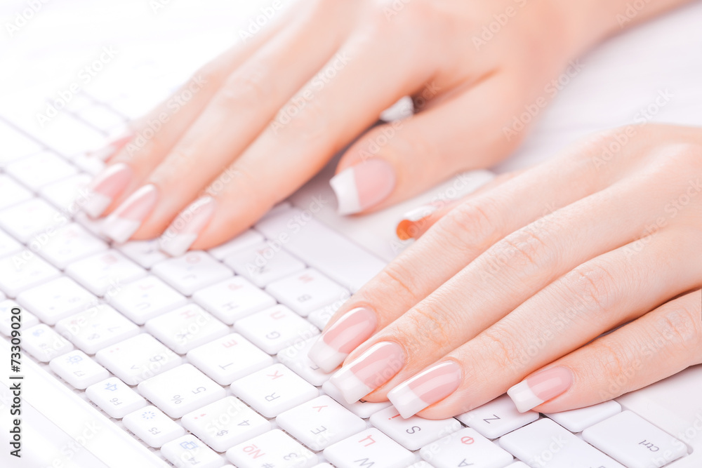 Hands of an office woman typing Hands of an office woman typing