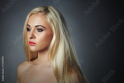 beautiful young woman.Sad blond girl.healthy hair.Beauty salon