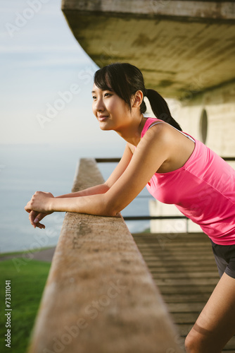 Relaxed sporty woman taking a rest