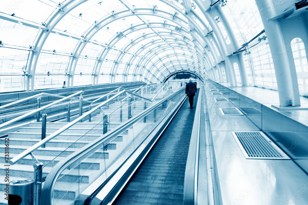 business people on escalator business people on escalator