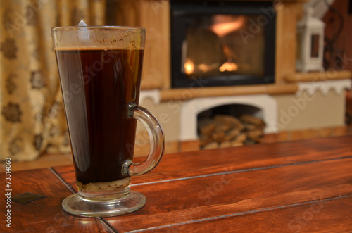 Cup of coffee on wooden table