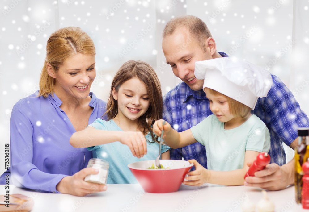 happy family with two kids making salad at home happy family with two kids making salad at home