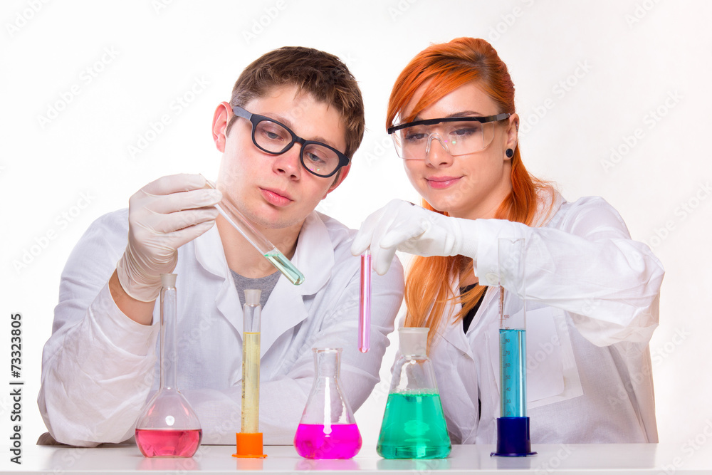 Students in chemistry lab doing reactions Students in chemistry lab doing reactions