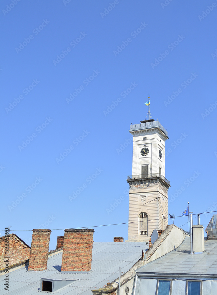 tower over roofes of the houses