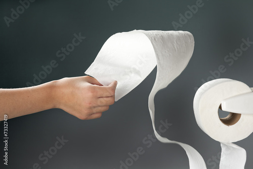 Yanking the toilet paper.