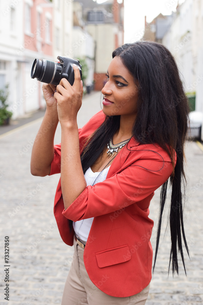 young woman taking a photo