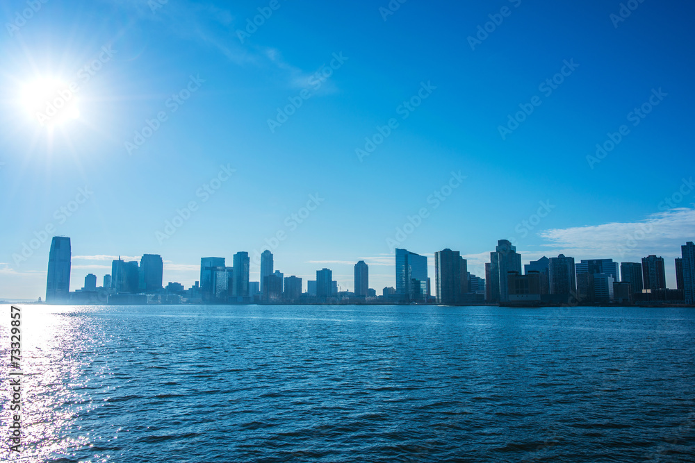 Skyline of Jersey City on bright summer day