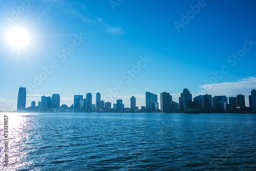 Skyline of Jersey City on bright summer day