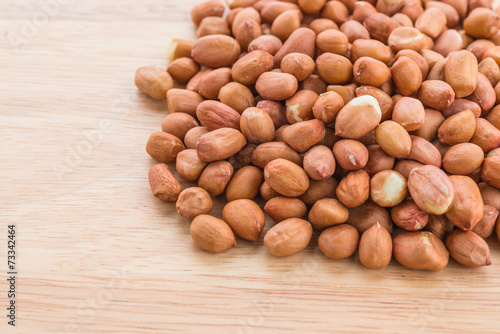 peanuts on wood background