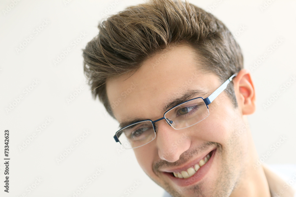 Portrait of young man wearing eyeglasses, isolated Portrait of young man wearing eyeglasses, isolated