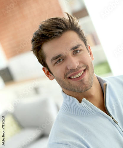 Portrait of young smiling man