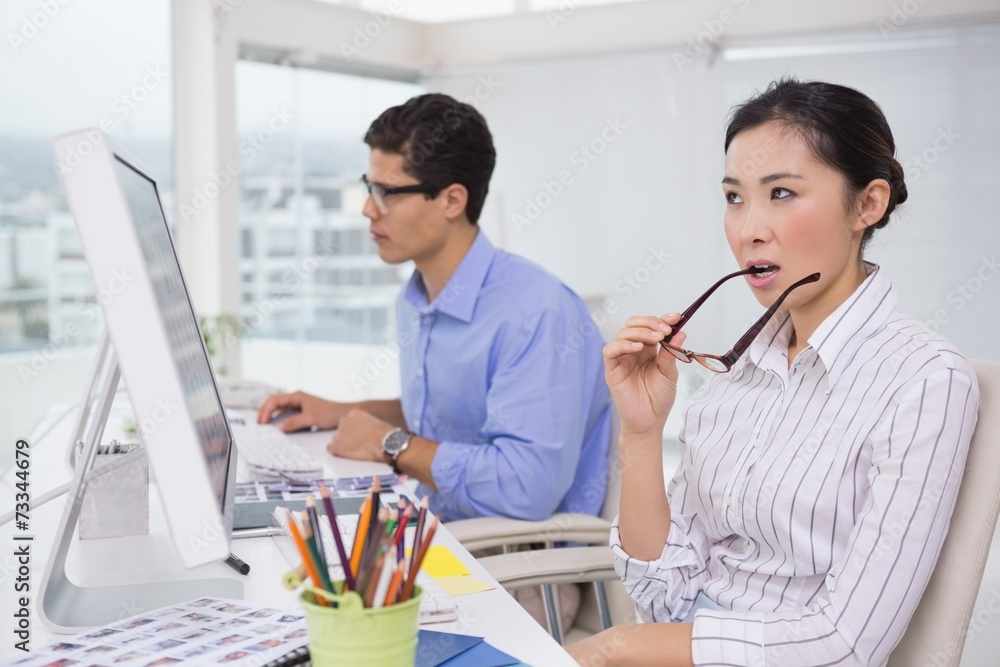 Obraz premium Creative team working at desk