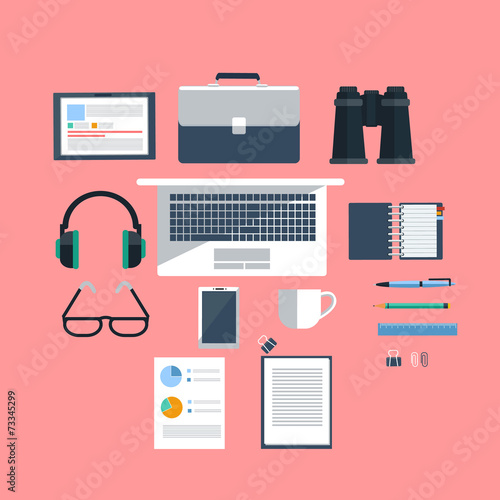 Workplace with laptop on pink background