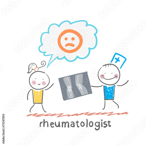 rheumatologist shows an x-ray the patient's legs