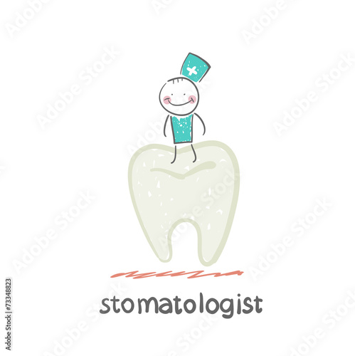 stomatologist stands on a large tooth