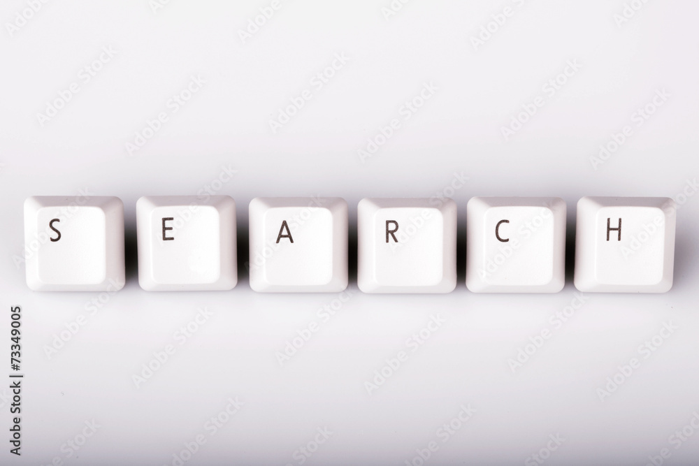text search formed with computer keyboard keys on white backgrou text search formed with computer keyboard keys on white backgrou