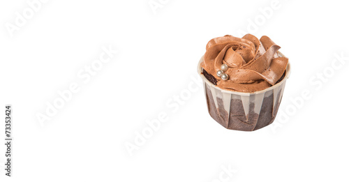 Moist chocolate cupcake over white background