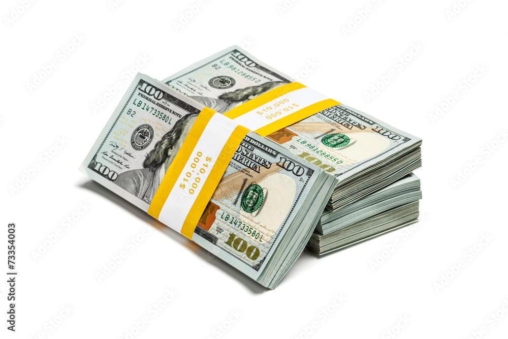 Bundles of 100 US dollars 2013 edition banknotes (bills) isolate