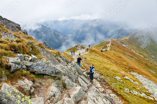 Fototapeta Naklejka Na Ścianę i Meble -  Group of tourists walking in the Tatra Mountains