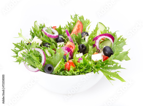 Fresh tasty salad over white