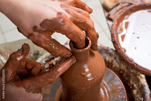 potter, creating an earthen jar