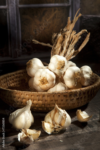 Organic garlic in a straw basket
