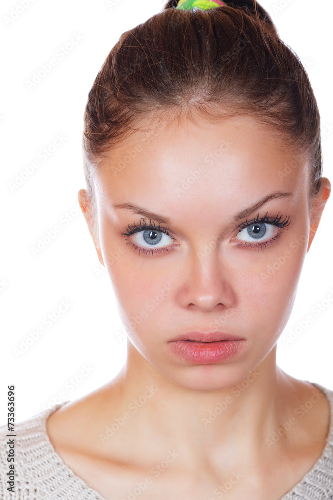 The girl with a stare on a white background The girl with a stare on a white background