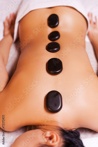 Hot stone therapy.