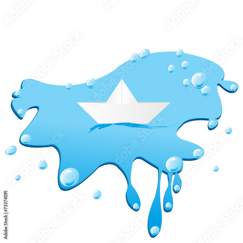 Paper sailing boat on water splash