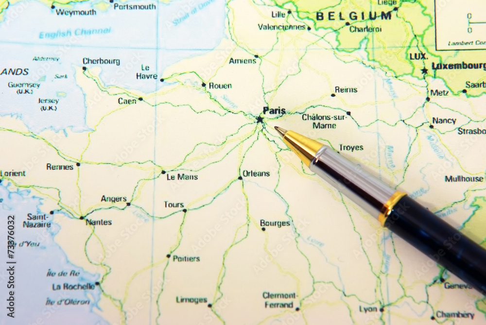 Ballpoint pen on map