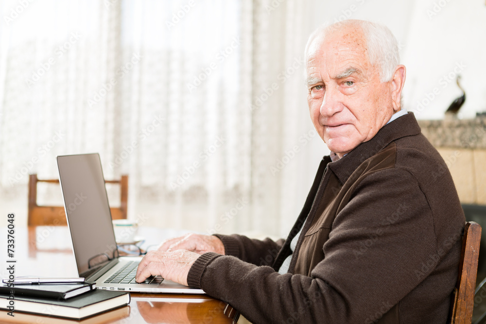 Senior working with Laptop, old man retired Senior working with Laptop, old man retired