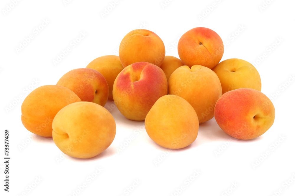 Some apricots isolated on white background Some apricots isolated on white background