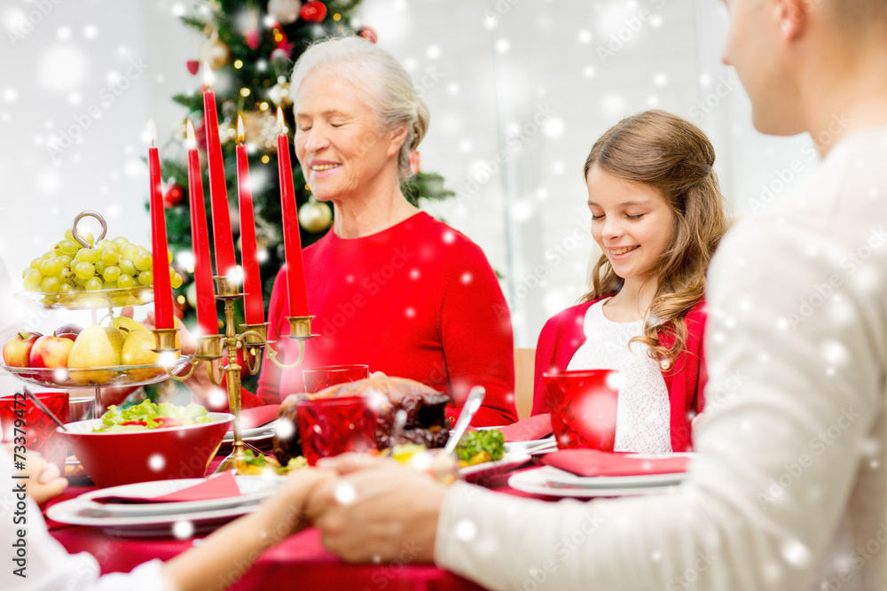 smiling family having holiday dinner at home smiling family having holiday dinner at home