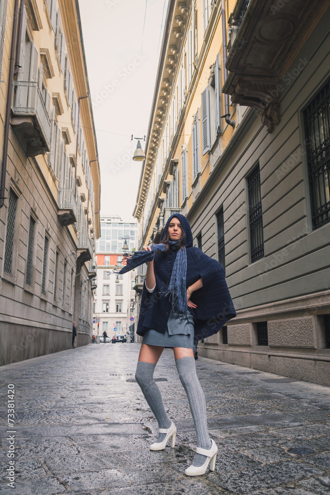 Beautiful girl posing in the city streets Beautiful girl posing in the city streets