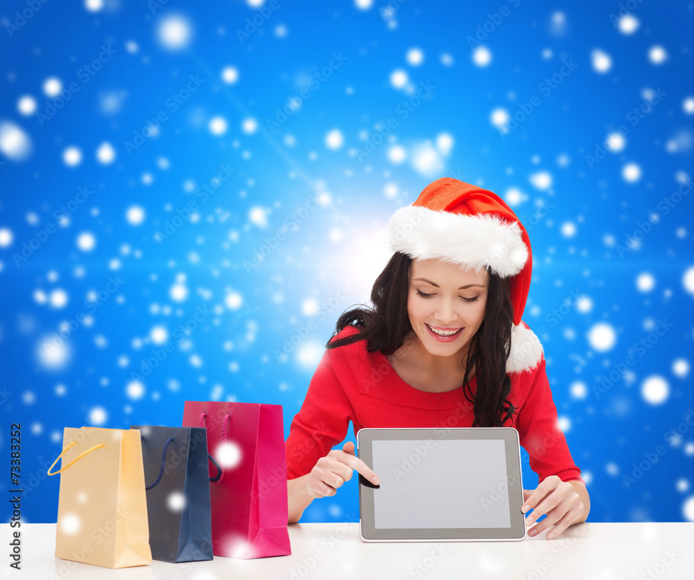 smiling woman with shopping bags and tablet pc smiling woman with shopping bags and tablet pc