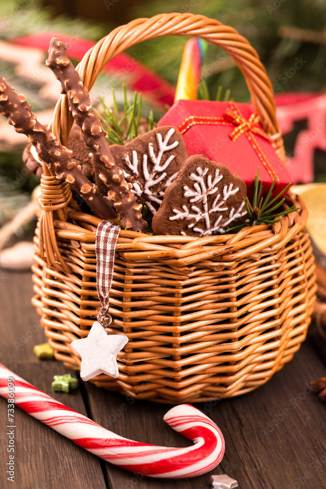 Festive basket of gifts and Christmas decorations closeup
