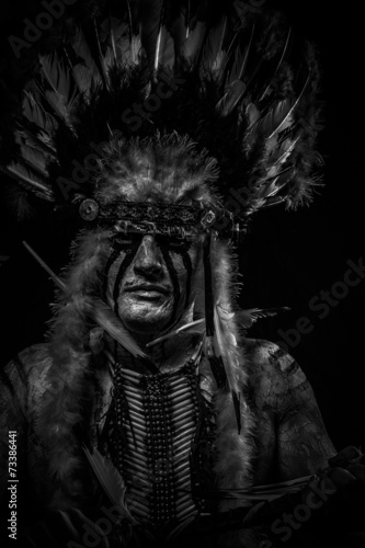 traditional Native, American Indian chief with big feather headd
