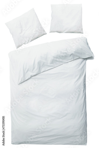 White blanket and pillows
