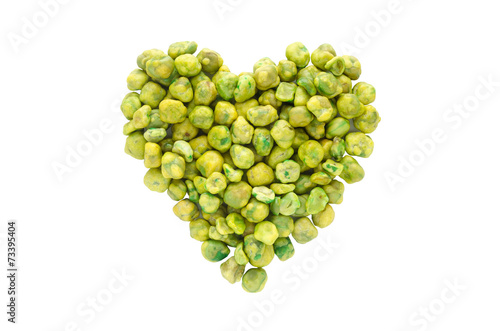 Love green ,heart shape from dry green pea isolated on white bac