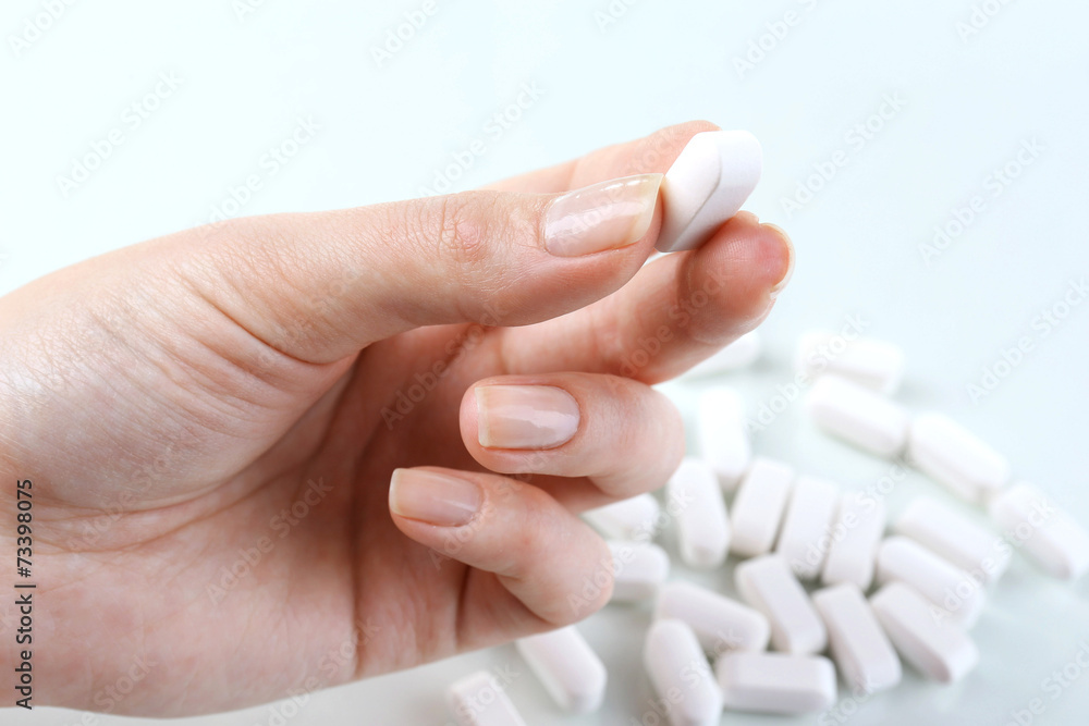 Pills in hand, close-up Pills in hand, close-up
